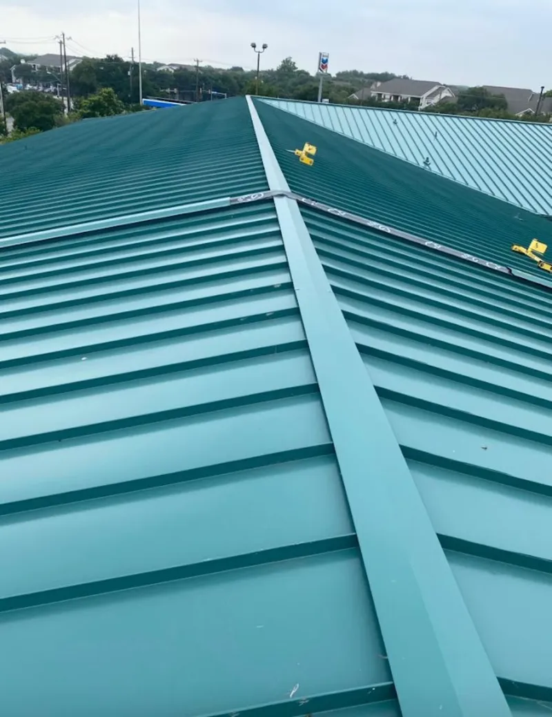 Green commercial metal roof ridge and valley for Metal Roof Repair in West Richland